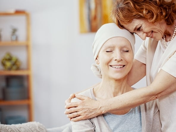 woman hugging ill patient